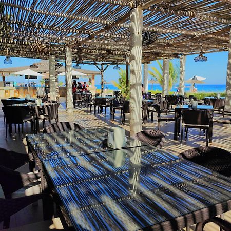 Sandy Beach Hotel & Resort Al Aqah Extérieur photo