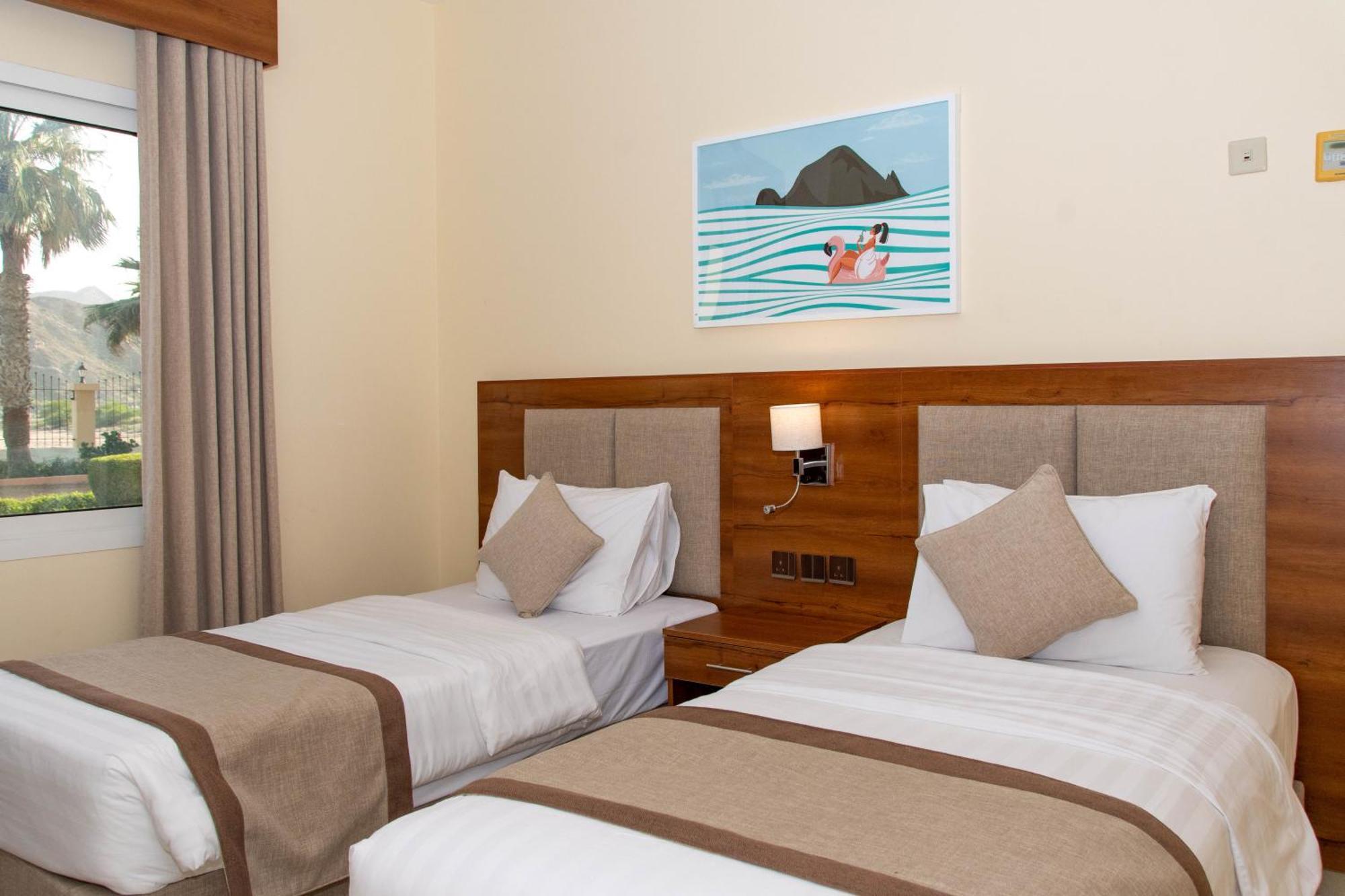 Sandy Beach Hotel & Resort Al Aqah Extérieur photo