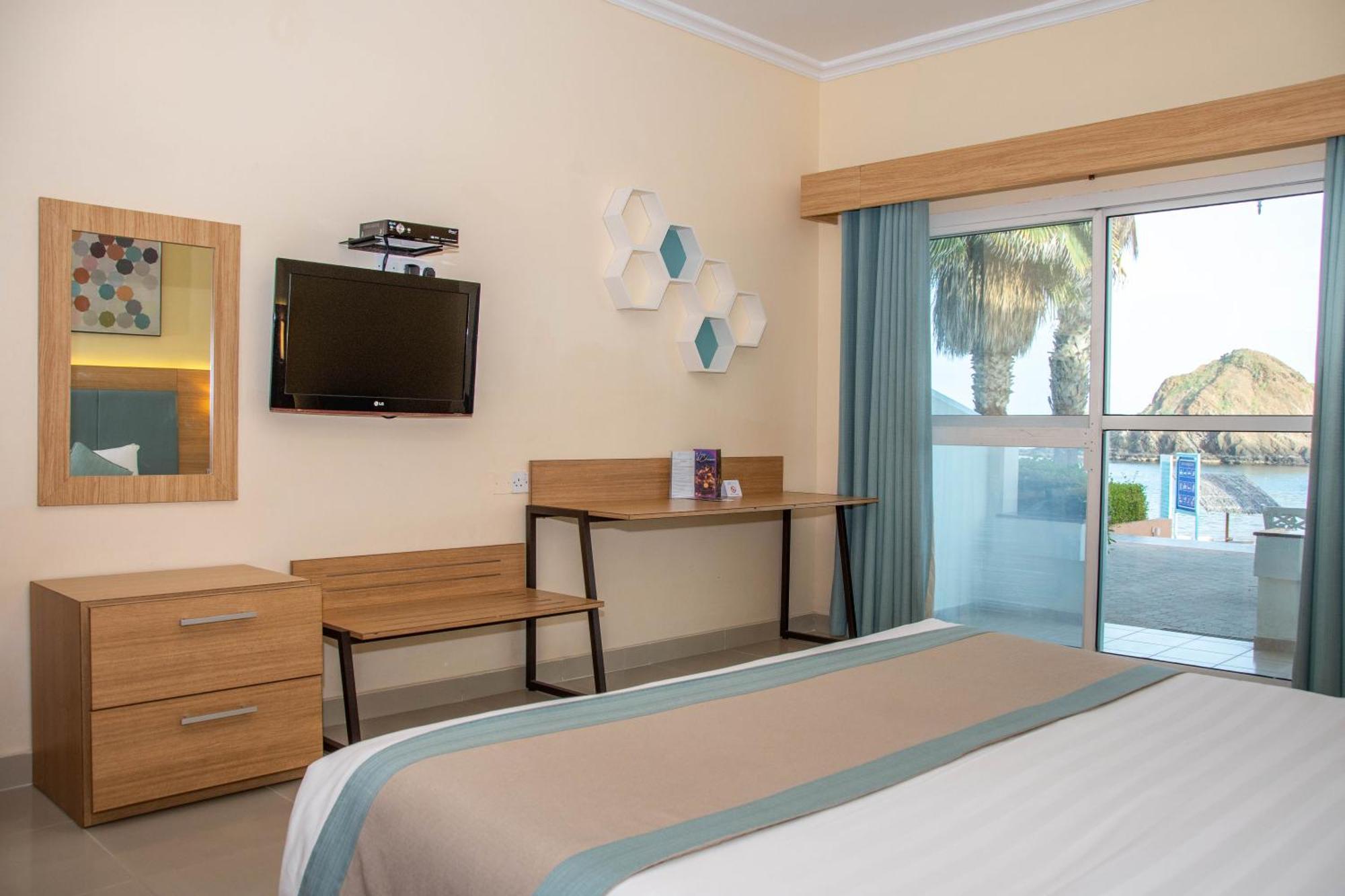 Sandy Beach Hotel & Resort Al Aqah Extérieur photo