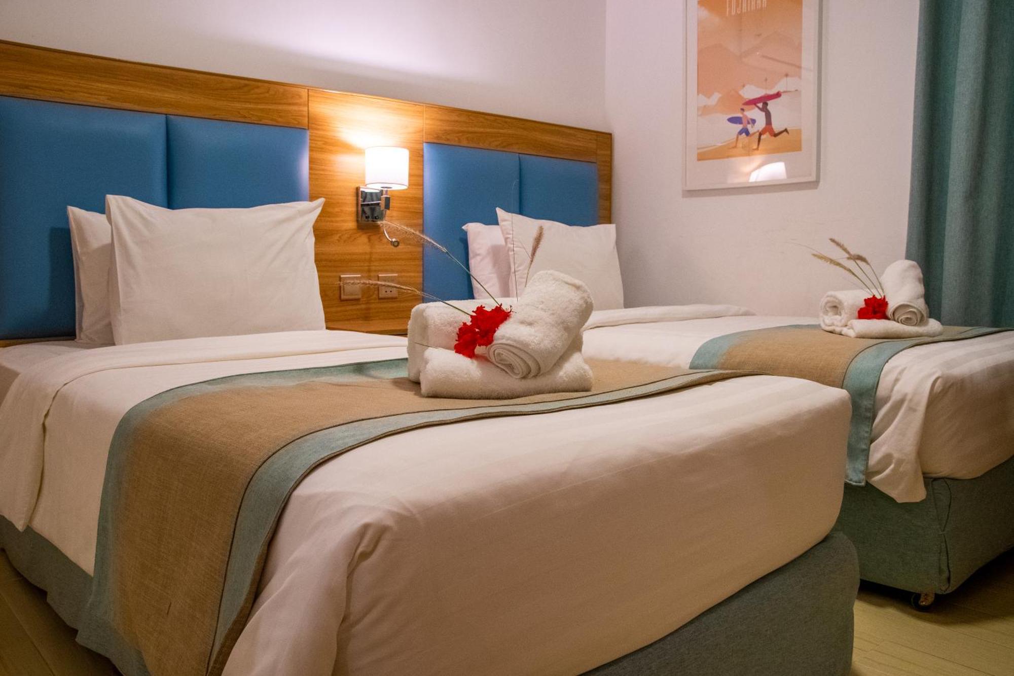 Sandy Beach Hotel & Resort Al Aqah Extérieur photo