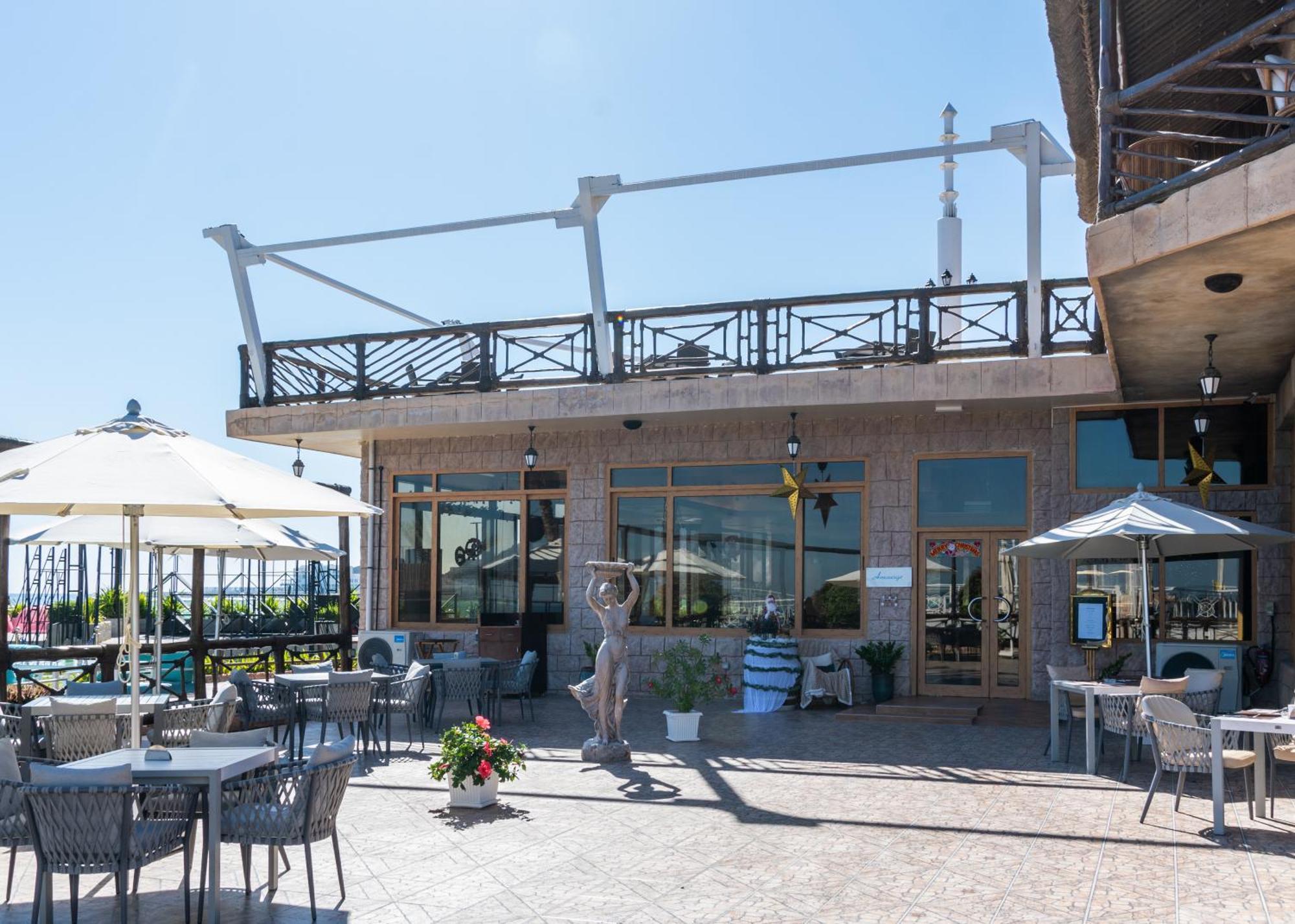 Sandy Beach Hotel & Resort Al Aqah Extérieur photo