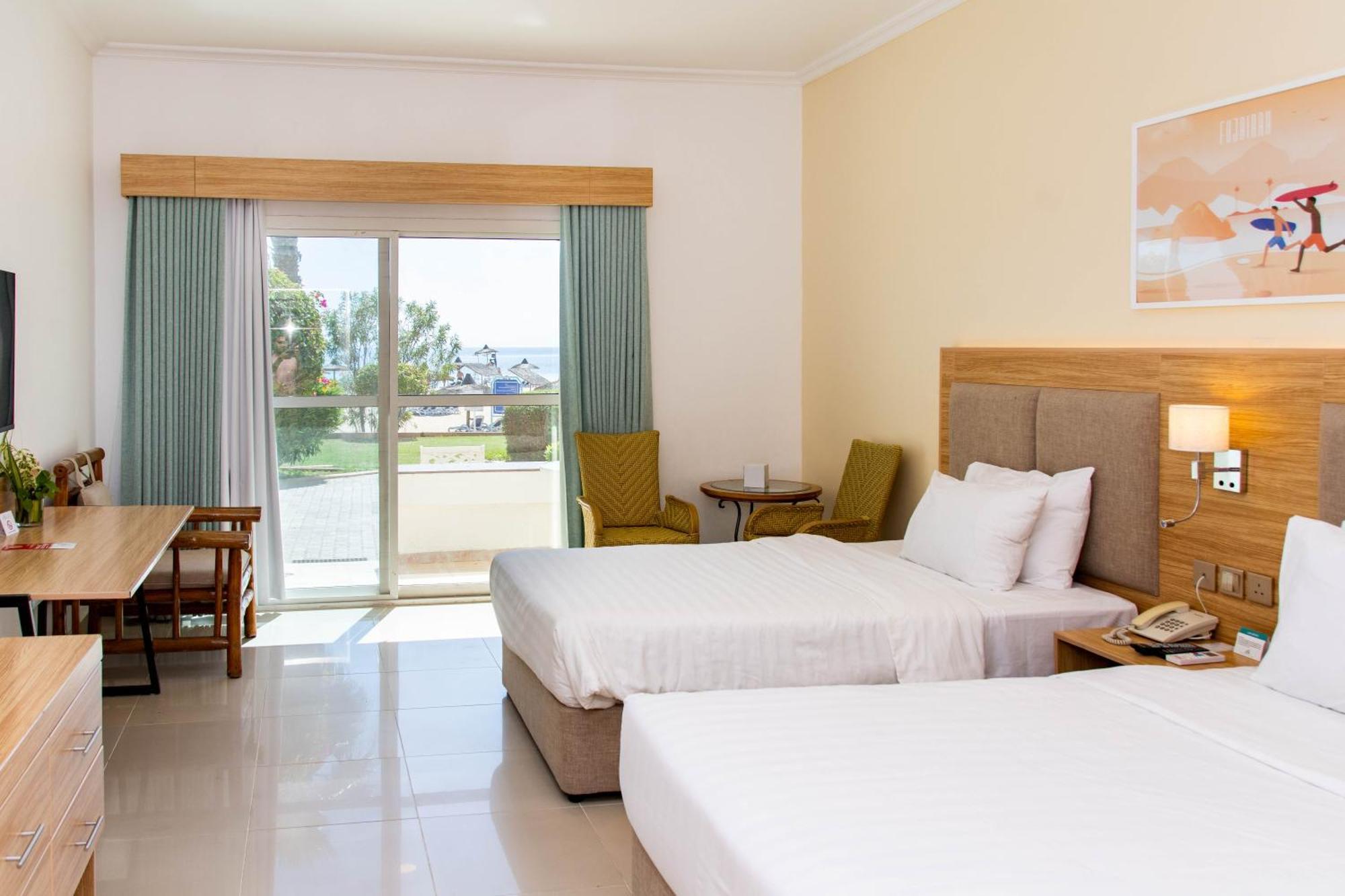 Sandy Beach Hotel & Resort Al Aqah Extérieur photo